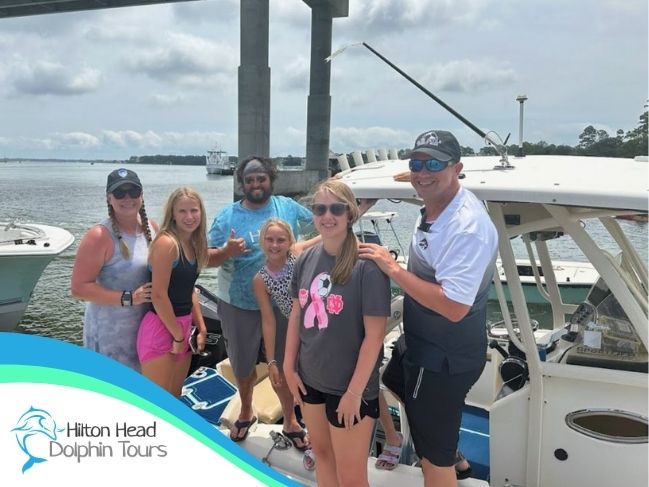 Family on a private boat tour in Hilton Head with kids enjoying the water with Hilton Head Dolphin Tours